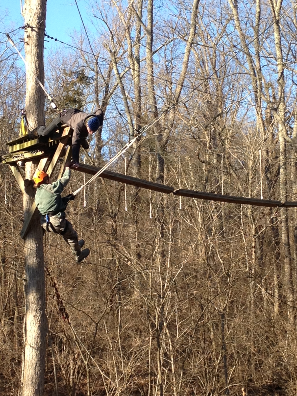 Cadet Garstang descends from through the Asbury Ropes Course via the 50ft tall swing.